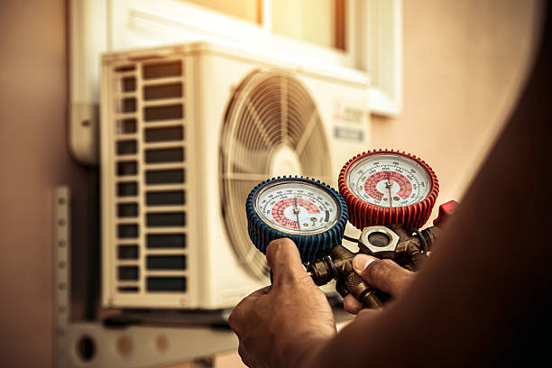 Professional Air Conditioning Service technician working in Woodbury, NY